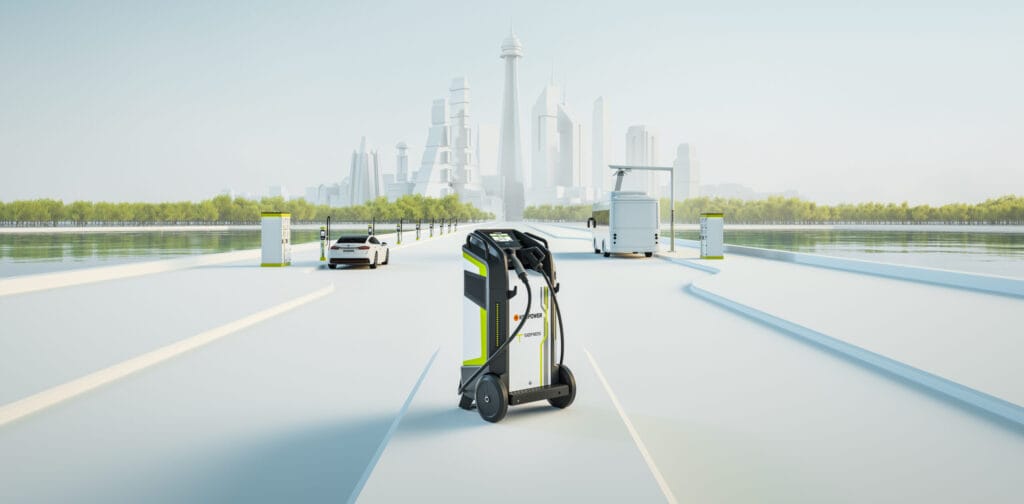 A futuristic cityscape features a sleek, robotic charger in the foreground on a wide, open road leading to the city. In the background, trees, modern buildings, a car, and a solar-powered structure can be seen under a clear blue sky.